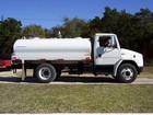 Side Of A White Drinking Water Truck